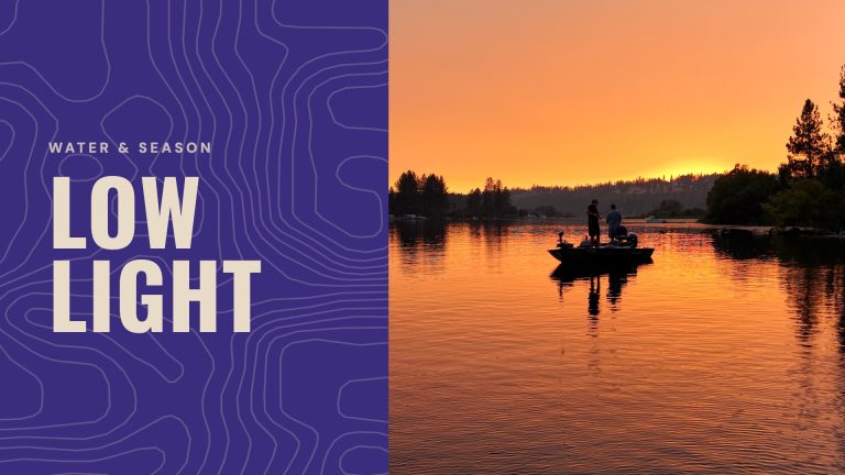 Cover reading "Low light" beside a boat on a lake at sunset